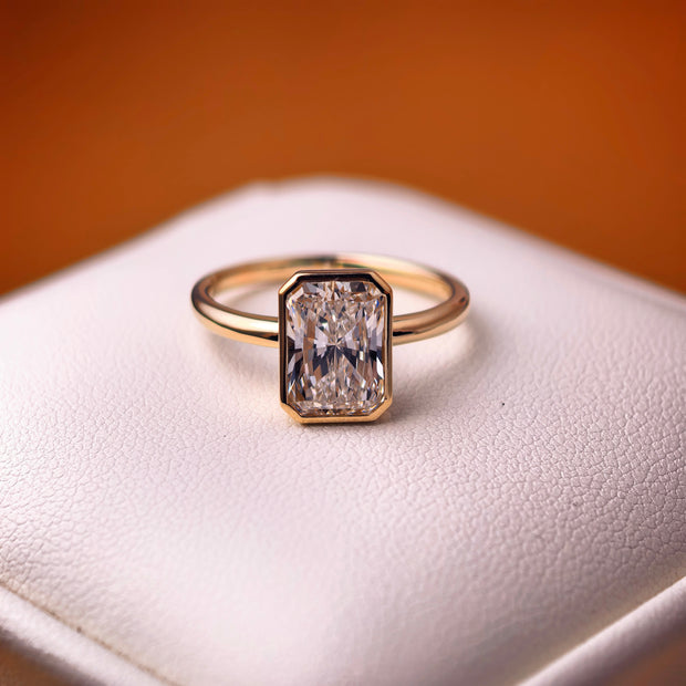 rt002 14K Yellow Gold 2.03 Carat Radiant Cut Lab-Grown Diamond E VVS2 Bezel Ring