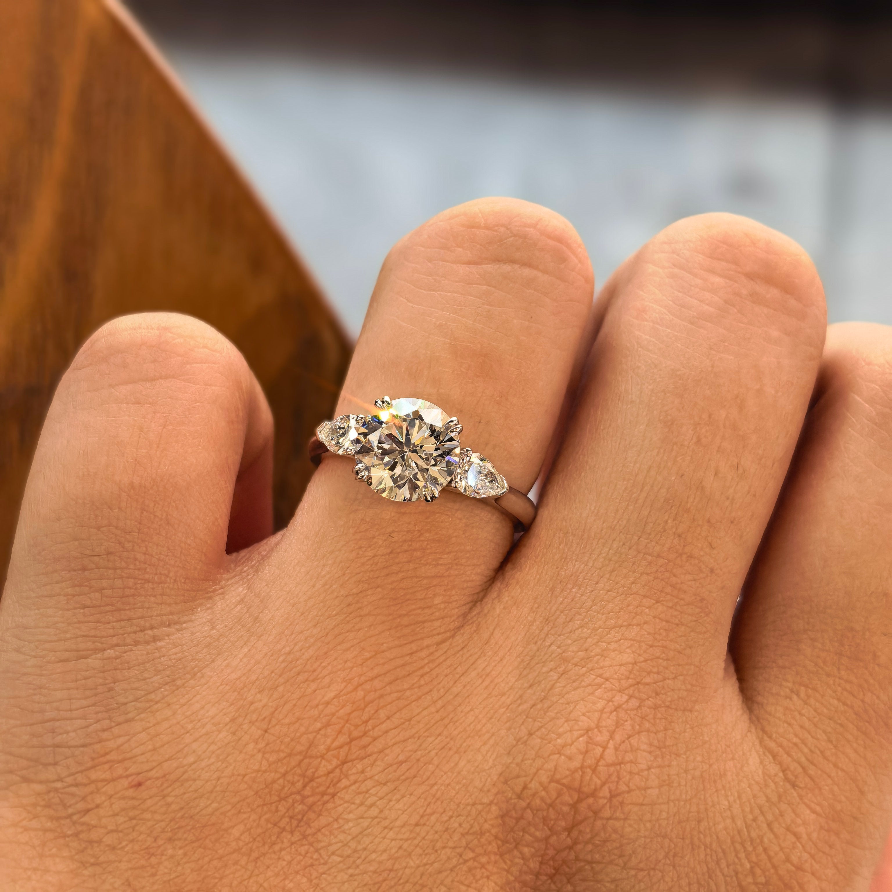 14k White Gold 2.00 Carat Round Lab-Grown Diamond E VVS2 Three-Stone Ring with Pear Side Stones