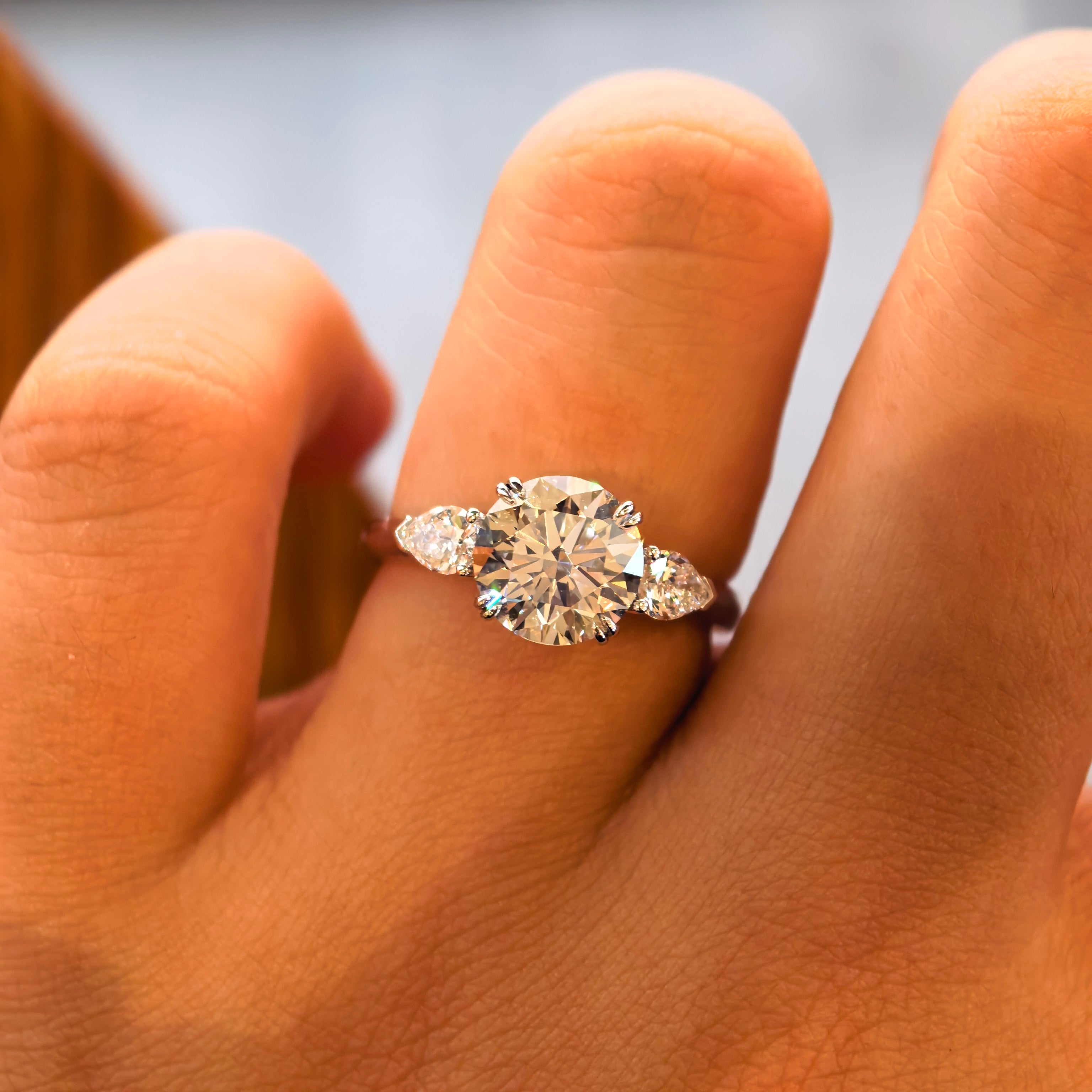 14k White Gold 2.00 Carat Round Lab-Grown Diamond E VVS2 Three-Stone Ring with Pear Side Stones