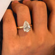 18K Yellow Gold 4.26 Carat Pear Shape Lab-Grown Diamond E VVS2 Ring with Diamond hidden Halo