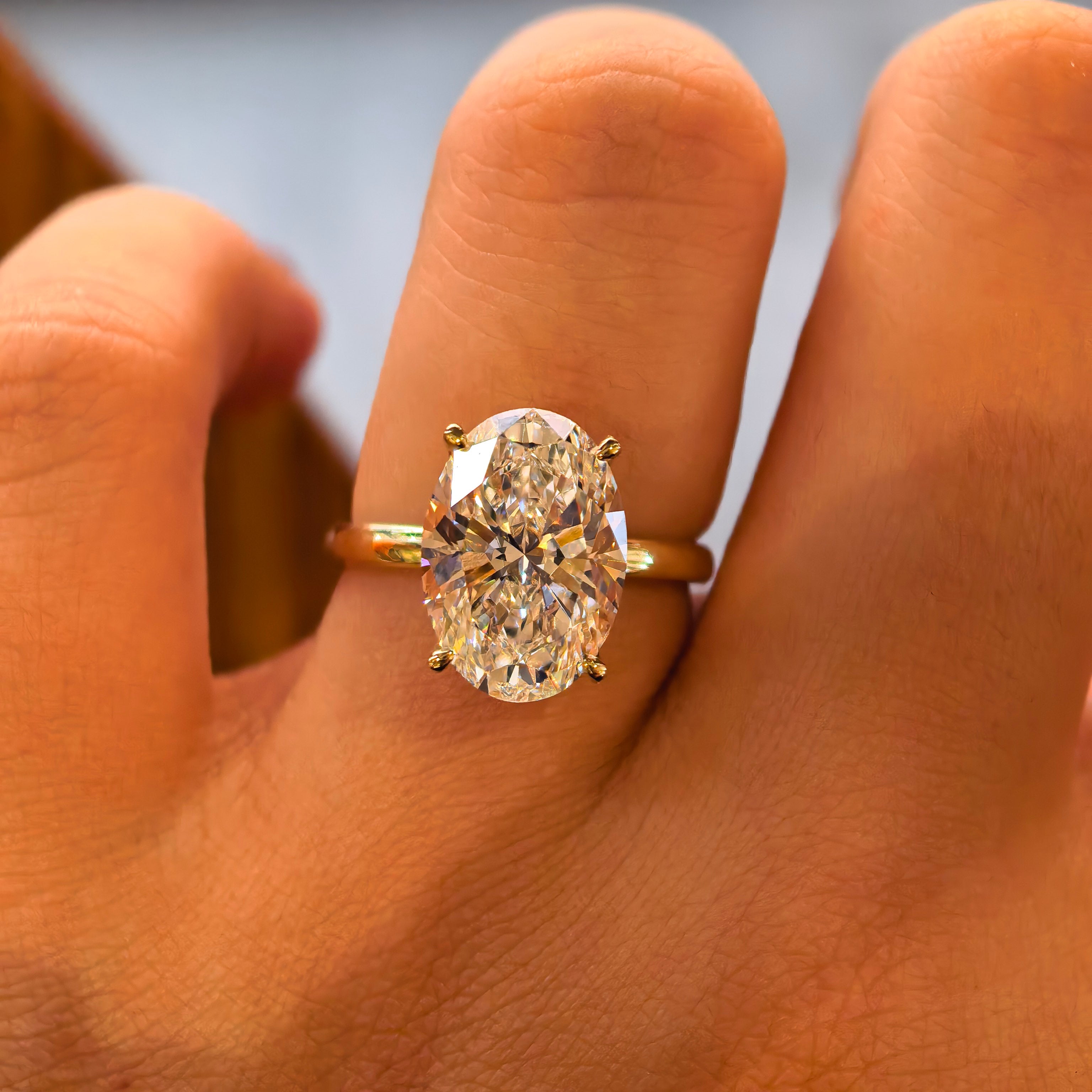 14k Yellow Gold 5.09 Carat Oval Cut Lab-Grown Diamond E VVS2 Hidden Halo