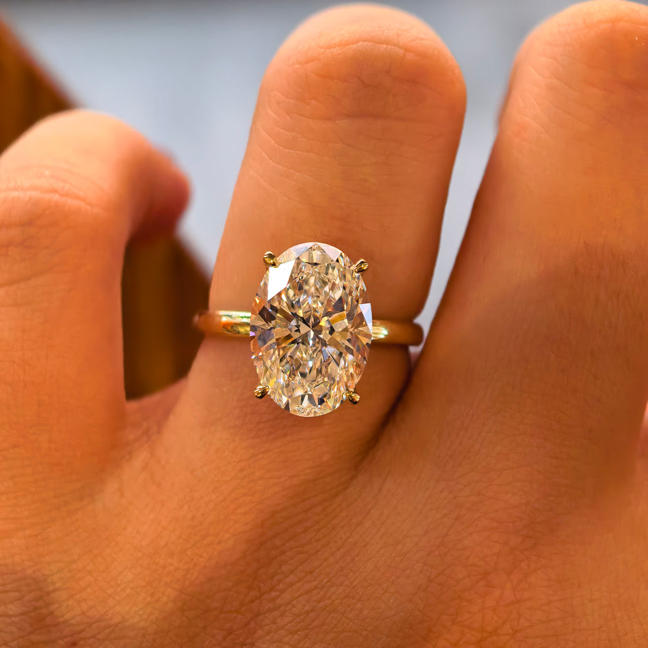 14k Yellow Gold 5.09 Carat Oval Cut Lab-Grown Diamond E VVS2 Hidden Halo