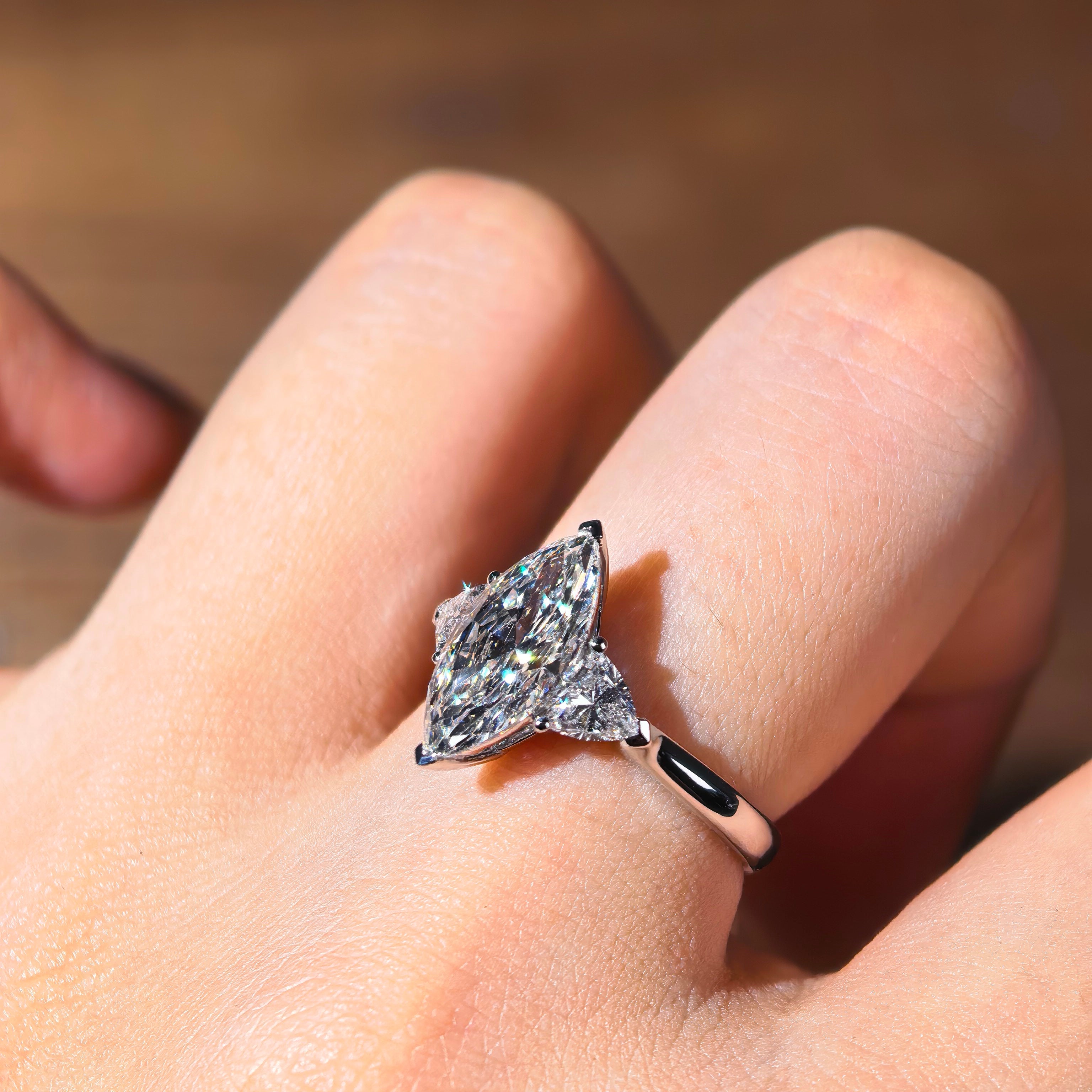 me002 14K White Gold 2.01 Carat Marquise Cut Lab-Grown Diamond E VVS2 Three-Stone Ring